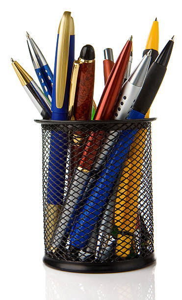 istock holder basket full of pens isolated on white 120113486