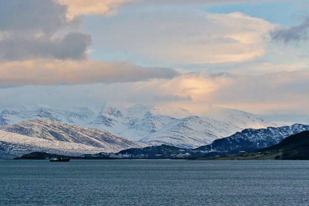 istock Scenic View Of Snowcapped Mountains Against Sky During Sunset 1201135977