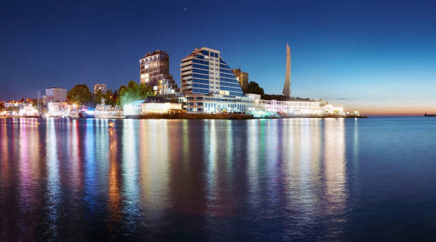 istock Night city by the sea. 1201137932