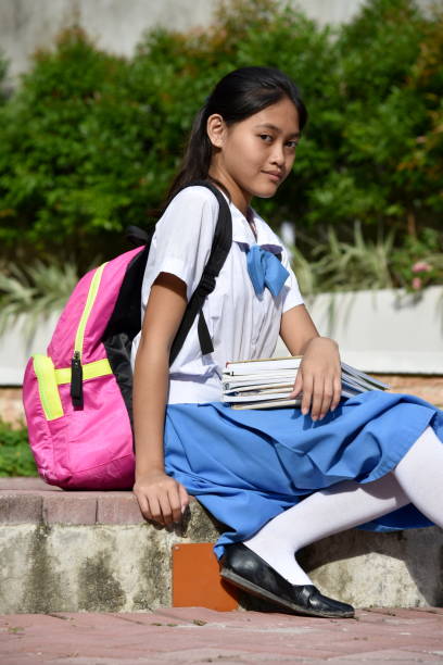 istock An A Sitting Asian Girl Student 1201138373