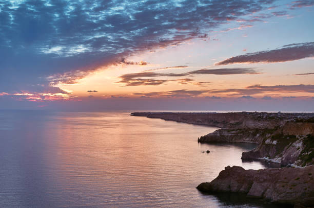 istock Sea and coastal cliffs at sunset. 1201138396