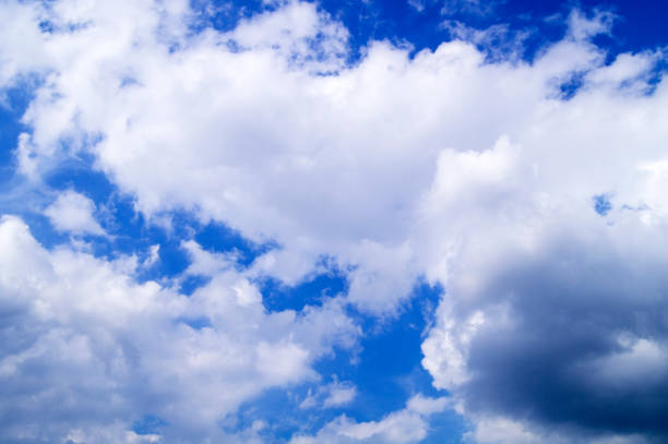 istock Blue sky is covered with gray and white clouds 1201139224