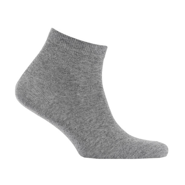 istock Blank grey  cotton medium sock on invisible  foot isolated on white background as mock up for advertising, branding, design, side view, template. 1201139277