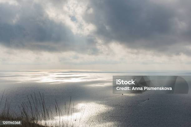Grey Clouds Over The Sea Stock Photo - Download Image Now - Altostratus, Autumn, Horizon