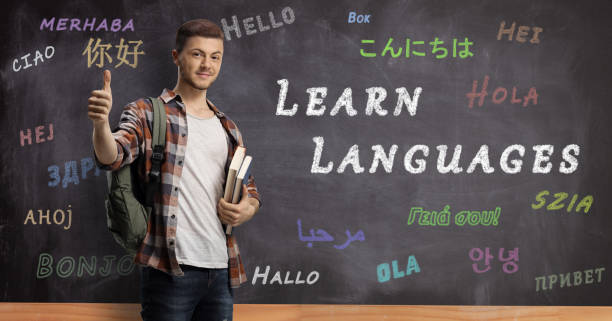 istock Student in front of a blackboard in school for foreign languages 1201141288