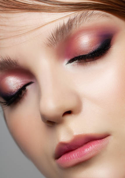 istock Beautiful woman face close up portrait studio on white 1201141766