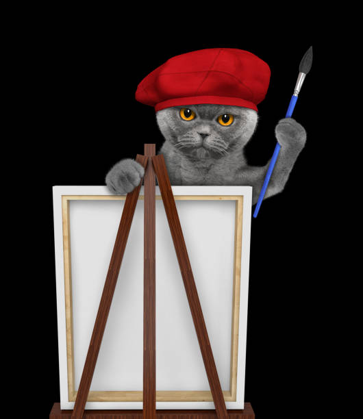 Cute cat is a painter artist. Isolated on black background