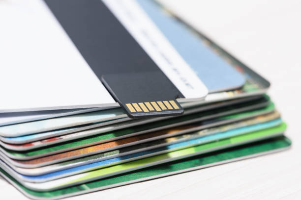 istock Micro SD memory card on Bank cards 1201143663