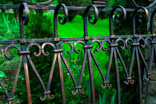 istock Metal fence with forged elements 1201143982
