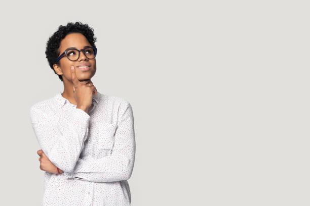 istock Pensive biracial girl look at blank copy space thinking 1201144459