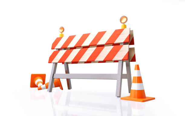 Traffic Cones and Construction Barrier On White Background Orange colored traffic cones and construction barrier on white background. Horizontal composition with clipping path and copy space. barricade photos stock pictures, royalty-free photos & images