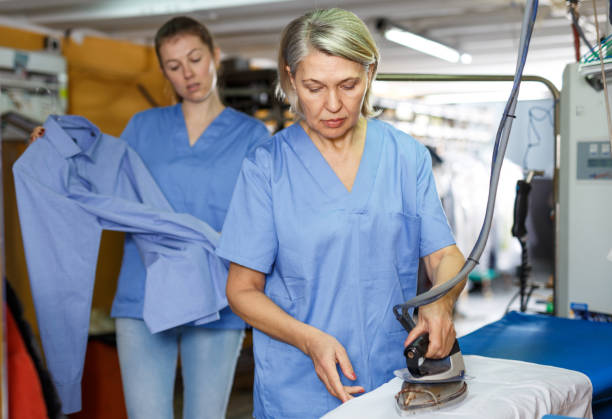 istock In process of ironing clean clothes 1201144817