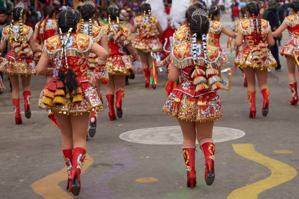 Oruro, Bolivia - February 26, 2017: Diablada dancers in ornate costumes parade through the mining city of Oruro on the Altiplano of Bolivia during the annual carnival.