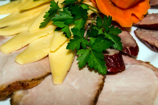 istock Meat a white plate with cheese and parsley 1201145519