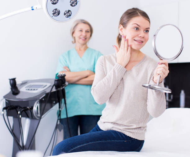 istock Smiling woman after cosmetological procedure 1201147809