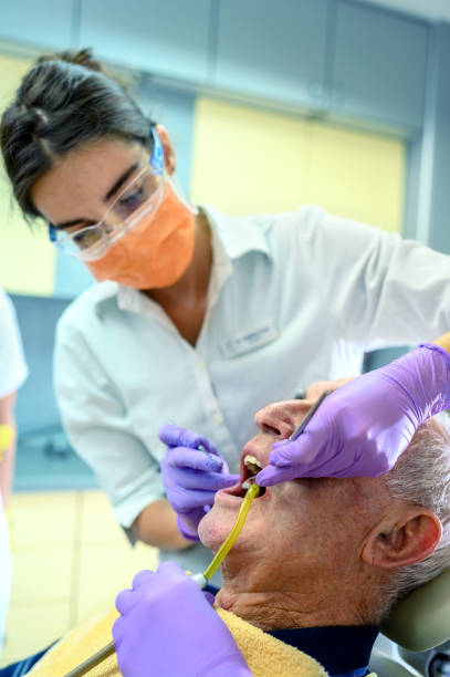 istock Senior man at the dentist 1201148071