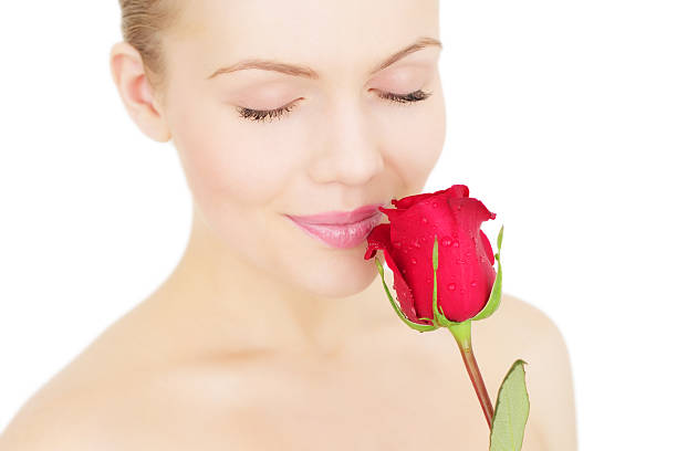 istock girl with a red rose on white background 120114824
