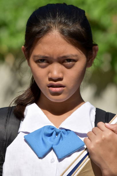 istock Pretty Diverse Girl Student And Confusion 1201148734