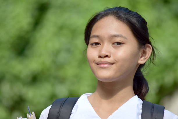 istock A Serious Young Filipina Girl Student 1201148736