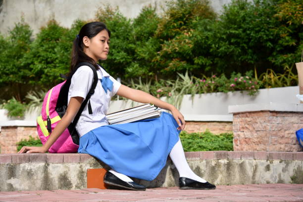 istock A Girl Student Wearing Skirt 1201149594