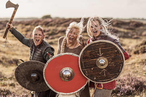 A small group of viking female warriors outdoors