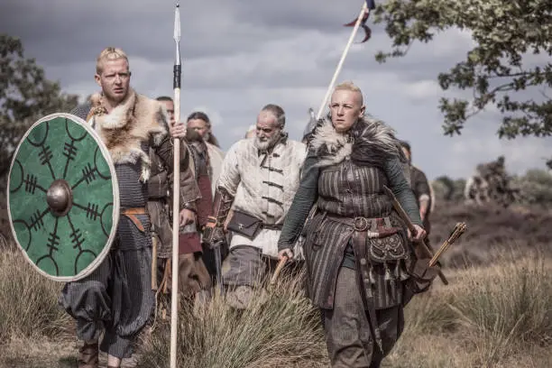 Viking warriors on highland moors leading a scouting mission during a battle