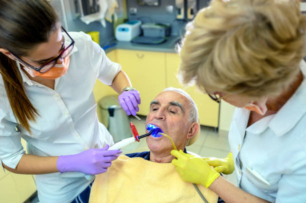 istock Senior man at the dentist 1201151712