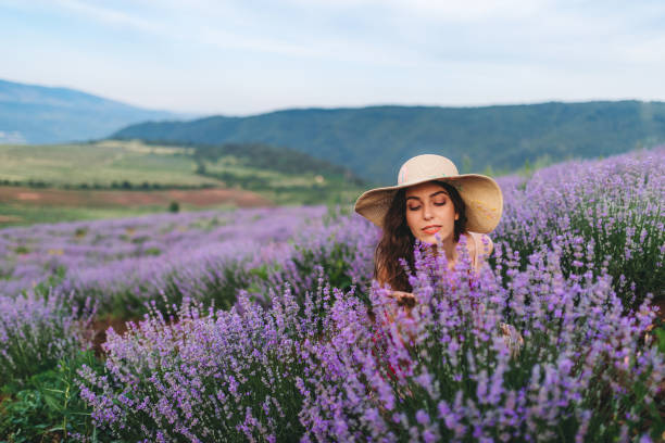 istock Young joyful woman in lavender field 1201152401