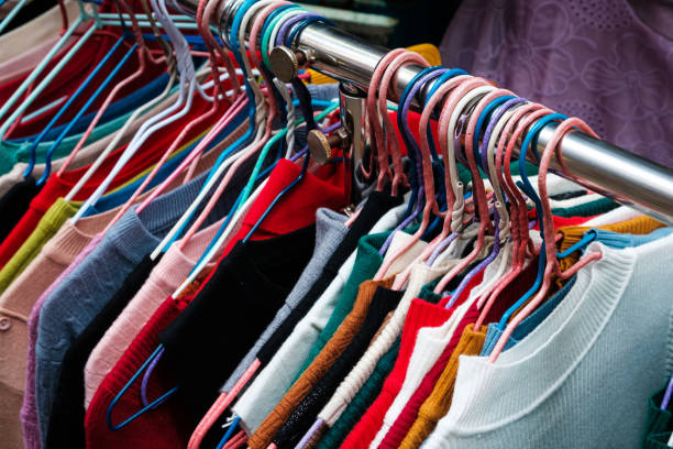 istock t-shirts and sweaters closeup, second hand clothing - 1201152955