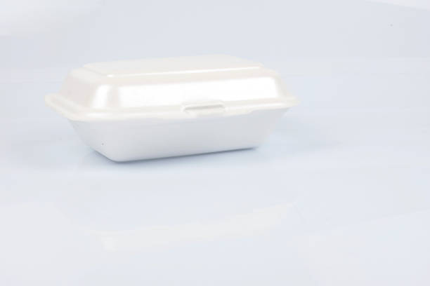 istock unhealthy polystyrene lunch boxes with take away meal isolated on white background. 1201153566