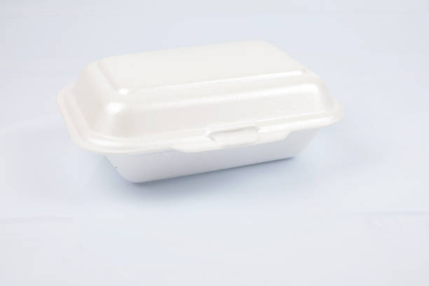 istock unhealthy polystyrene lunch boxes with take away meal isolated on white background. 1201153583