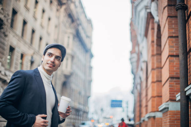 istock Modern man standing on the street 1201154537