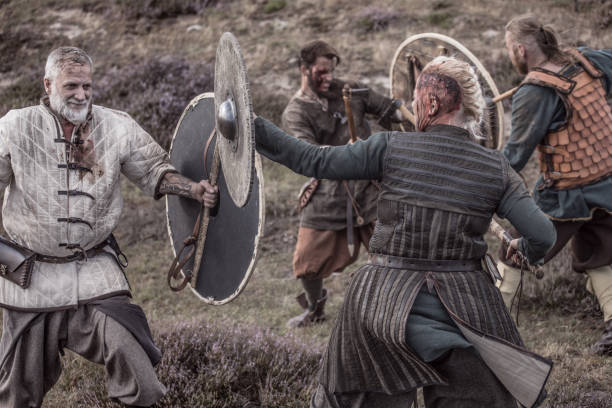 istock Two strong viking warriors fighting in hand to hand combat 1201156156