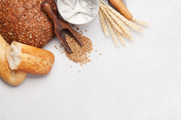 istock Various bread with wheat, flour and cooking utensils 1201160011