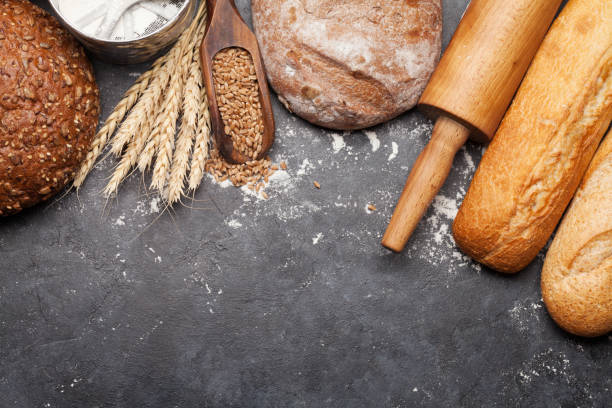istock Various bread with wheat, flour and cooking utensils 1201160517