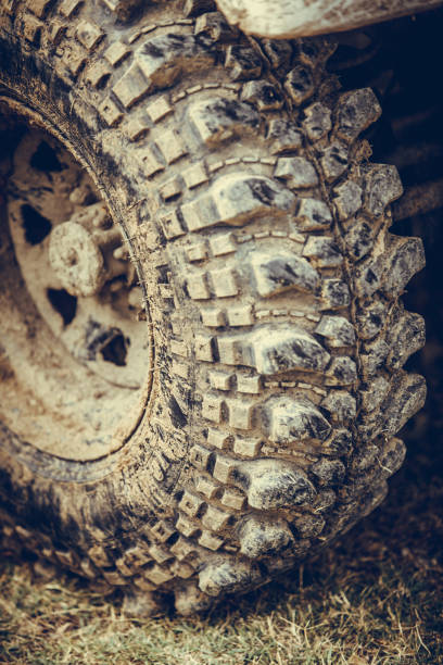 istock Muddy off road tire on a 4x4 car 1201163124