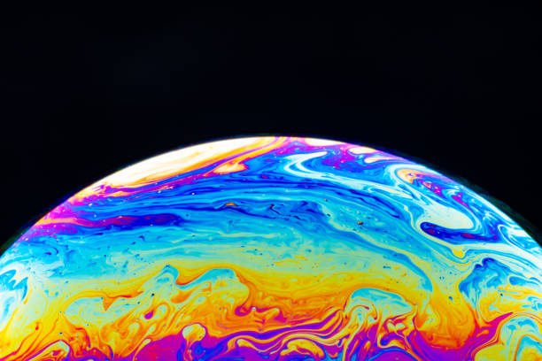istock Macro shot of a soap bubble hemisphere. Abstract colorful liquid background. 1201166752