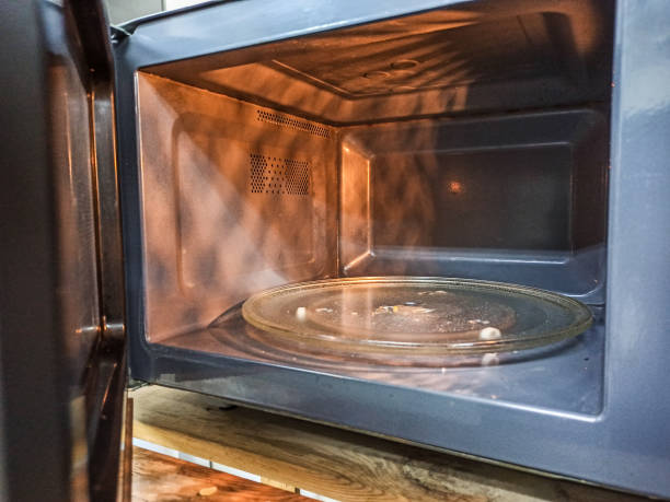 wewnątrz kuchenka mikrofalowa - timer cooking domestic kitchen time zdjęcia i obrazy z banku zdjęć