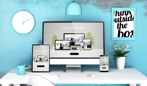 Photo of blue studio with responsive web design on devices mockup