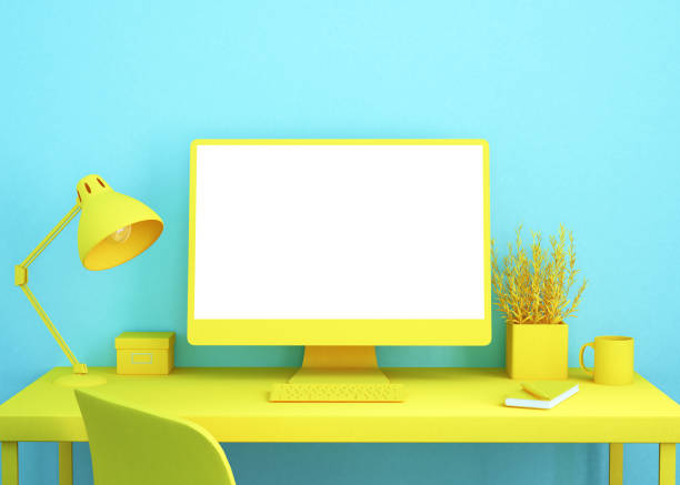 istock office desktop in yellow and blue 1201169719