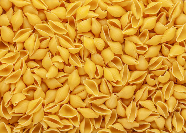 istock Pasta background made of Conchiglie 1201171106