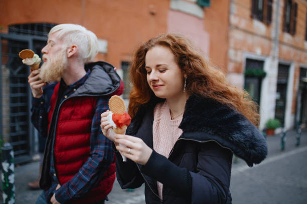istock Young couple on a date eating gelato 1201172350