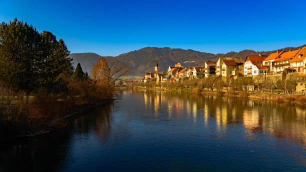 Frohnleiten panorama small town above Mur river in Styria,Austria. Famous travel destination. Frohnleiten, Styria, Austria 08.01.2020 - Frohnleiten small town above Mur river. View at Parish church, town and river Mur. Famous travel destination. frohnleiten stock pictures, royalty-free photos & images