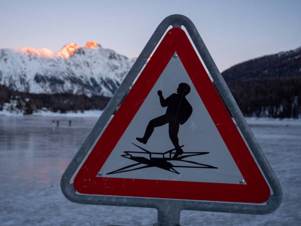 istock Warning sign on Frozen lake 1201173130