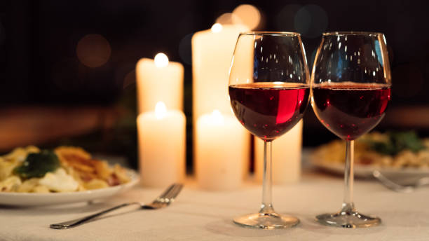 istock Two Glasses Of Red Wine On Served Restaurant Table Indoor 1201175521