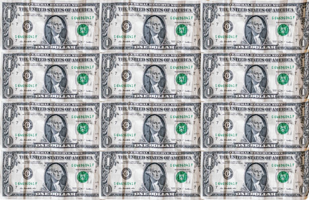 istock Dollar seamless pattern background.Money Pile $1 dollar bills 1201177312