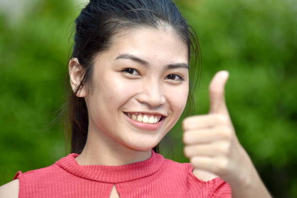 istock A Diverse Female With Thumbs Up 1201178148
