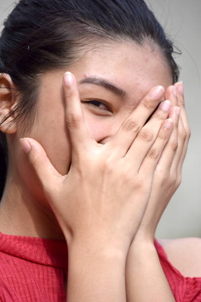 istock A Timid Beautiful Asian Person 1201181179