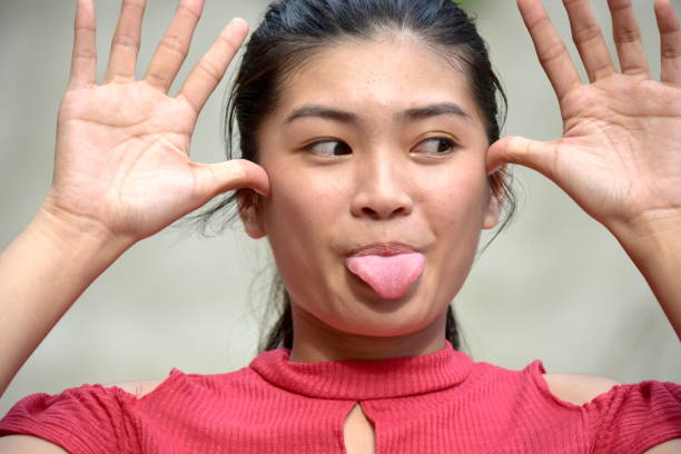 istock A Teen Girl Making Funny Faces 1201181246
