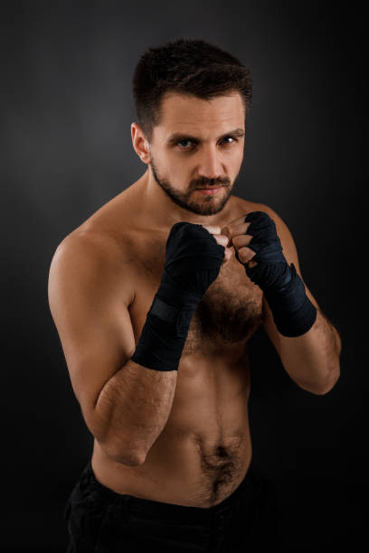 istock Muscular boxing man ready to fight. 1201184511